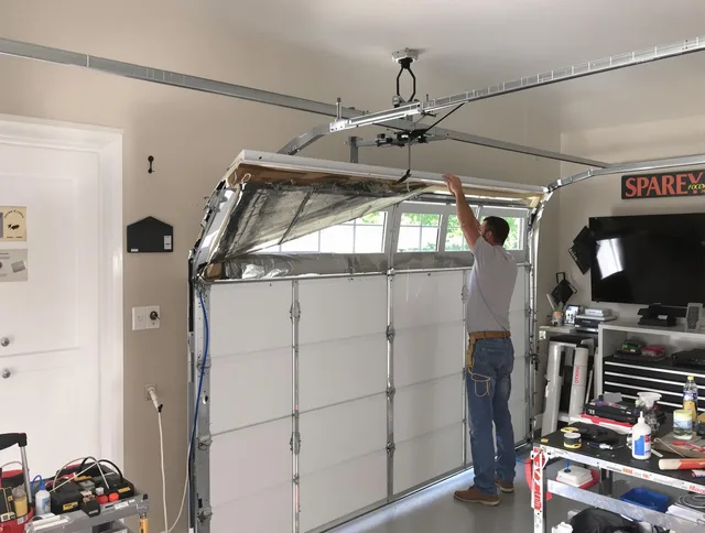 Garage door section replacement by Mansfield Garage Door Repair in Mansfield
